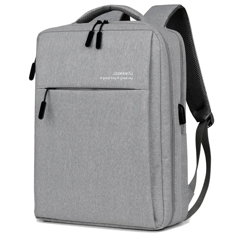 Black waterproof rechargeable backpack for a laptop, showing shoulder straps and a USB charging port.