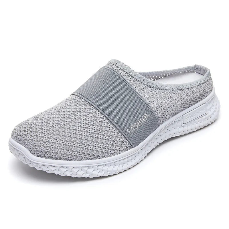 Women's casual shoes with mesh upper and hollow out detailing in round toe shape with flat heel