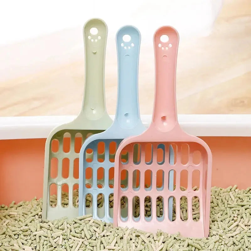 Blue plastic cat litter scoop with sand filter, shown next to a ruler indicating 20cm length.