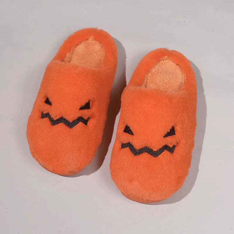 Orange Halloween pumpkin slippers with coral velvet upper and plush lining on non-slip PVC soles