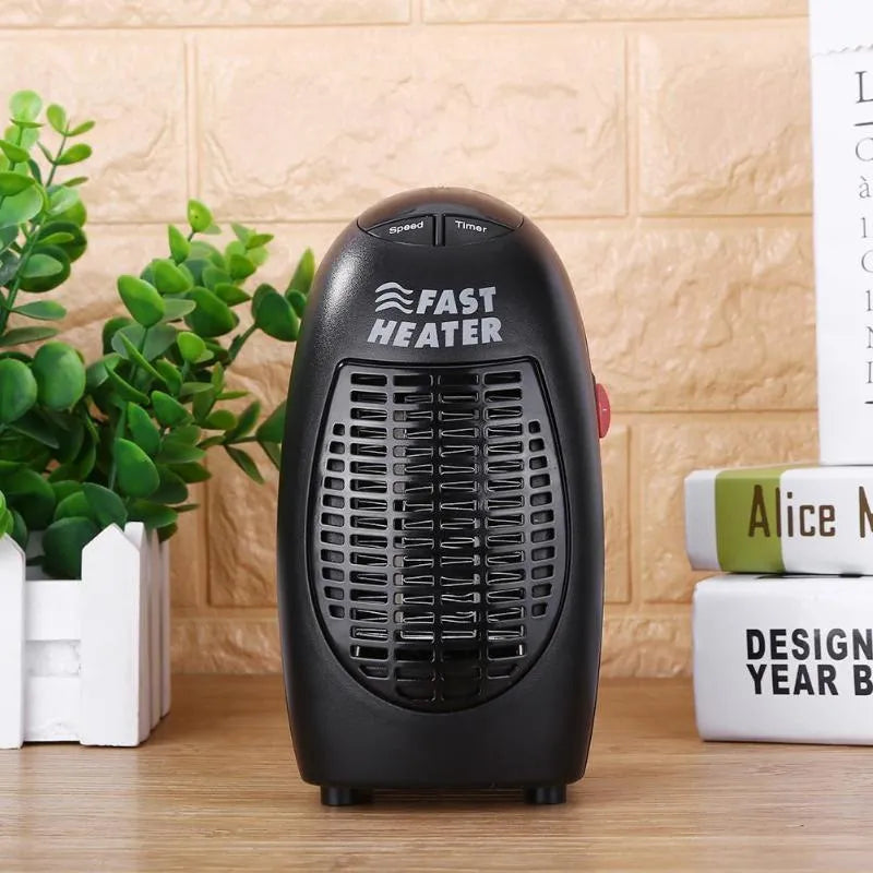 Black mini ceramic electric heater with digital display and rotating plug on white background