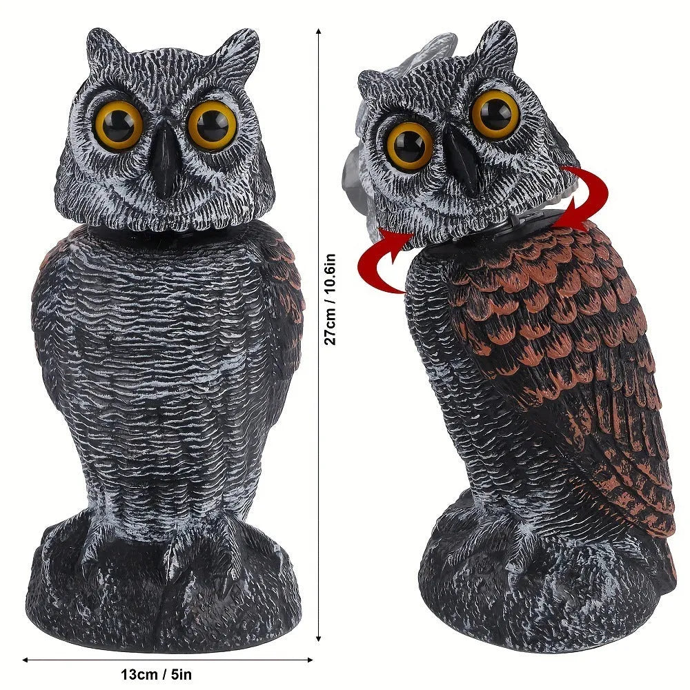 Artificial owl bait ornament with shaking head for garden bird deterrent in outdoor setting