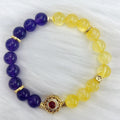 Handmade women's amethyst crystal bracelet with yellow and purple colour combination