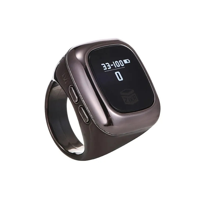 Al-Fatiha Zikr electronic counter unit showing digital display, compatible with watch straps.