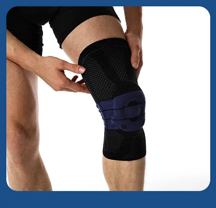 Adult sports kneepad in black and blue colours showing knee protection design