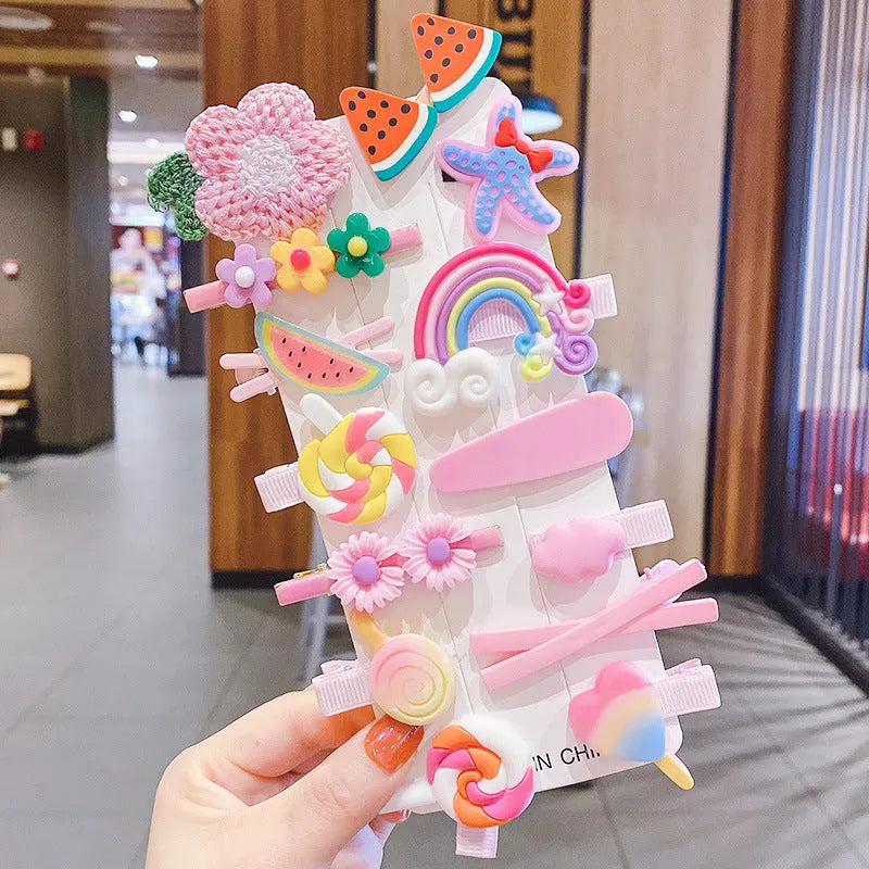 Colourful toddler hair accessories set with 14 pieces including rainbow barrettes, candy fruit pins, and butterfly clips