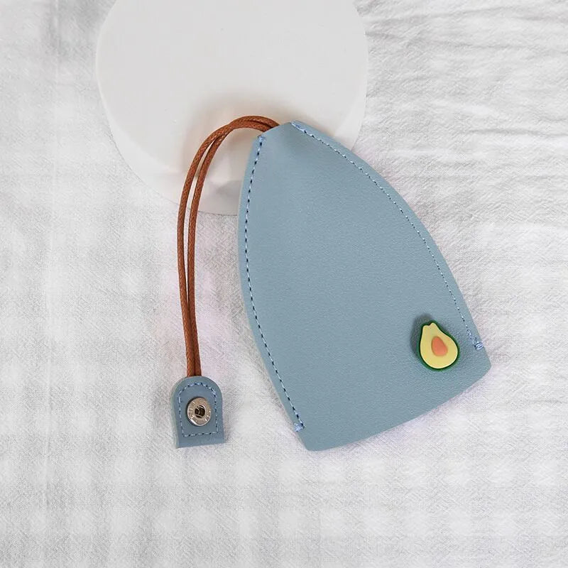 Cartoon design pull-out car key case made from soft PU leather, showing approximate size.