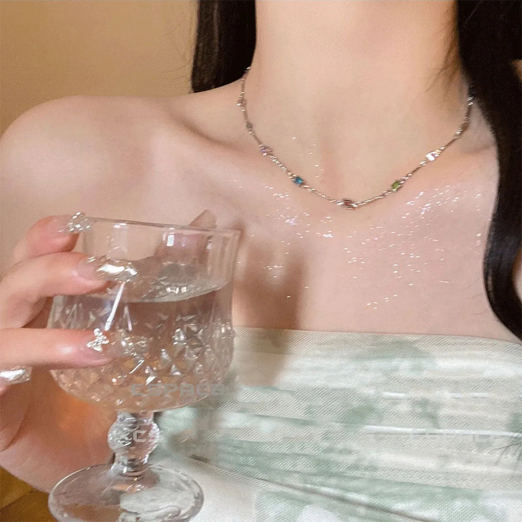 Square colour clavicle chain necklace with geometric quadrilateral links and artificial crystal detailing in gold finish