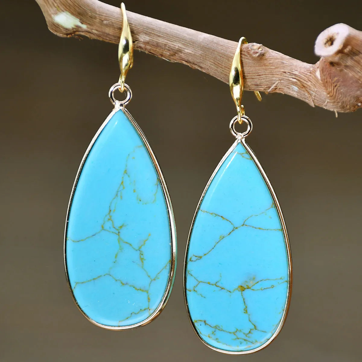 Vintage handmade stone drop earrings with water droplet shape in five colour options including tigereye and amethyst