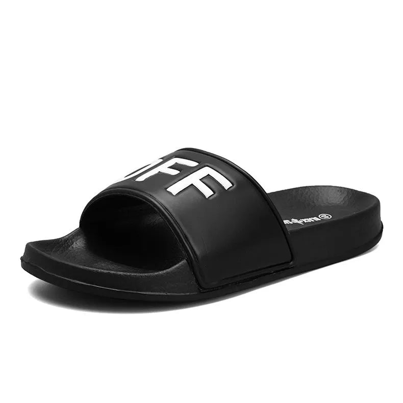 Men's black open-toe slippers with rubber soles showing personalised detail