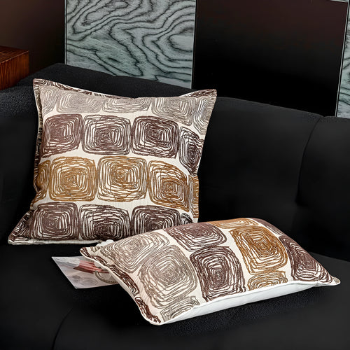 Abstract coil pattern pillow cover in cream and coffee colours showing square and rectangular size options