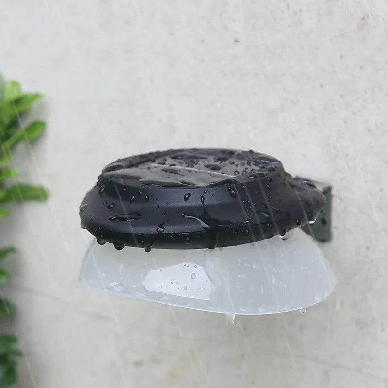 Black and white versions of a solar-powered Southeast Asian style outdoor wall lamp with 9 LEDs.