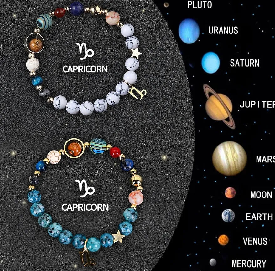 Set of two natural stone beaded bracelets featuring zodiac sign designs on a dark background