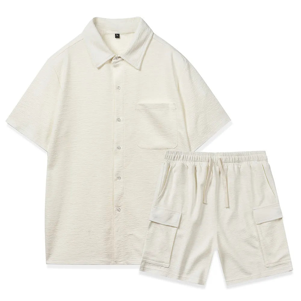 Women's beige elastic waist shorts and short sleeve top two-piece set laid flat.