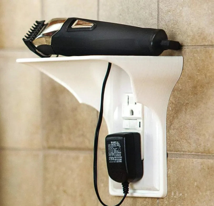 White plastic socket storage rack organiser with dimensions 14cm by 10cm by 15cm.