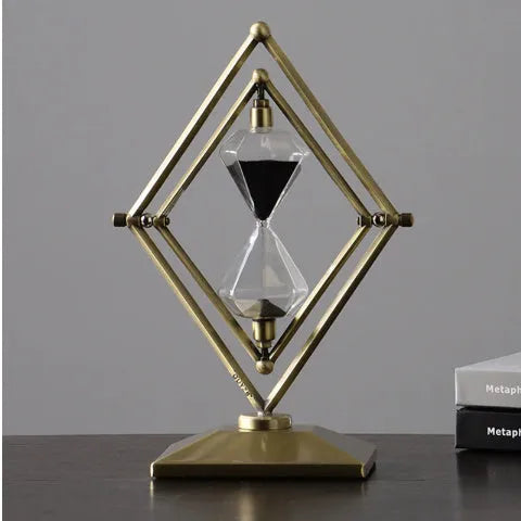 Zinc alloy metal and glass sand timer ornament with modern minimalist design in bronze or silver colour