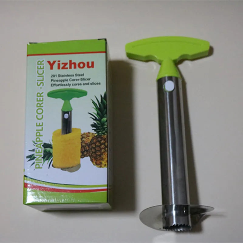 Stainless steel pineapple peeler with black handle and coring blade, 83.7 mm width, shown on white background