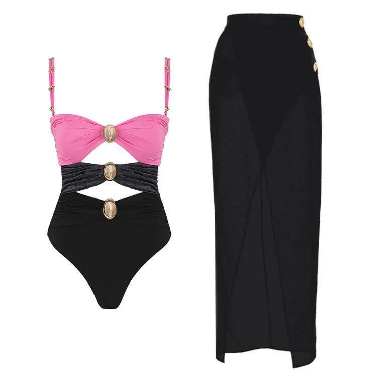 Women's one-piece swimsuit with matching skirt in assorted colours showing gold button detail