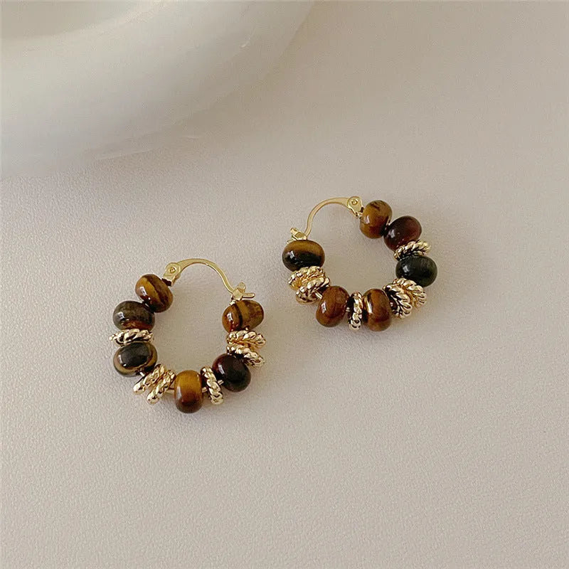 White retro Maillard tigereye women's trendy earrings with electroplated finish on plastic material