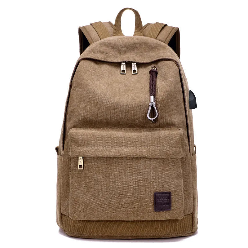 Canvas USB rechargeable backpack with laptop compartment showing multiple storage pockets