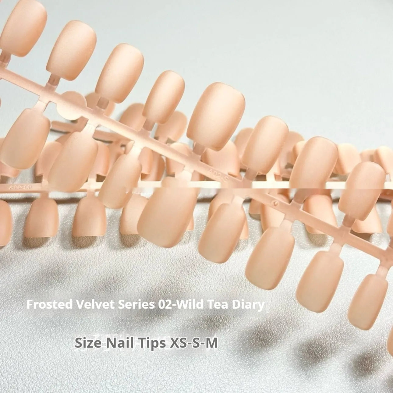 Velvet frosted Cat's Eye false nails with Aurora armour finish in short ladder XS, S, and M sizing options