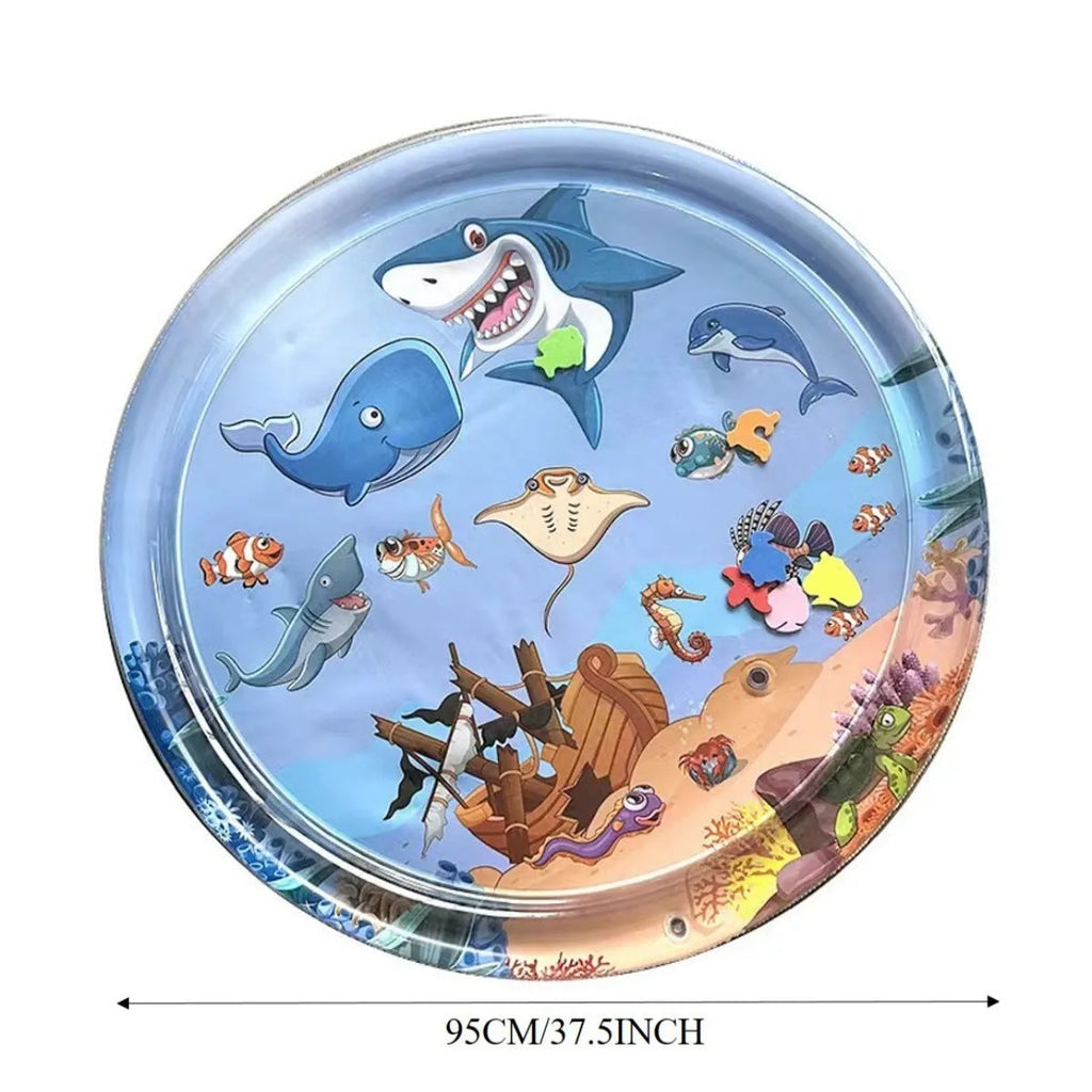 Large square blue water sensory playmat for cats on a floor, showing floating fish toys inside.