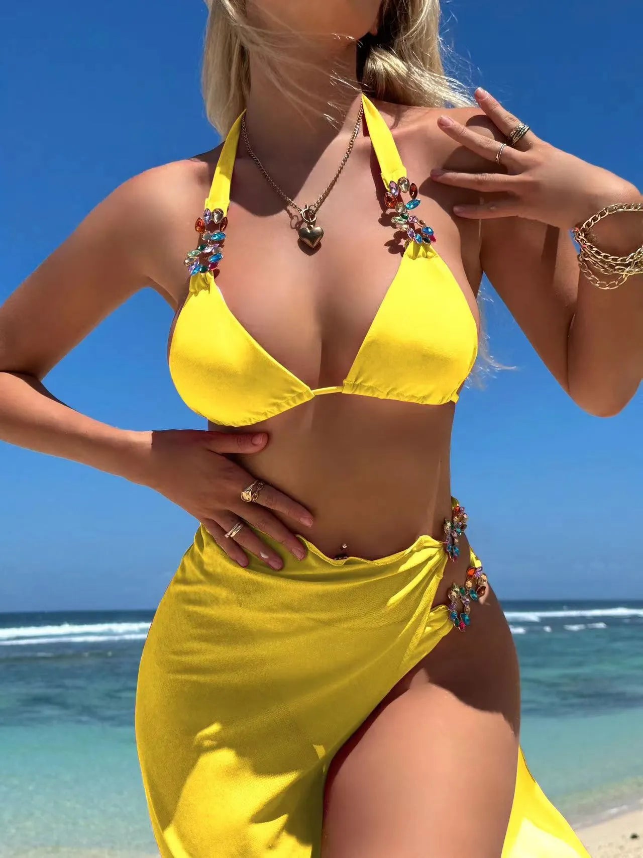 Light diamond solid colour three-piece swimsuit set with a long mesh skirt in rose red or yellow.