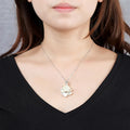 Copper lotus pendant necklace earrings hairpin set with electroplated finish on white background