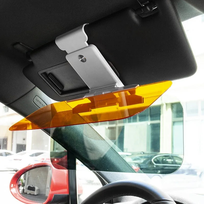 Dual-function anti-glare car sun visor with telescopic arm and acrylic lens.