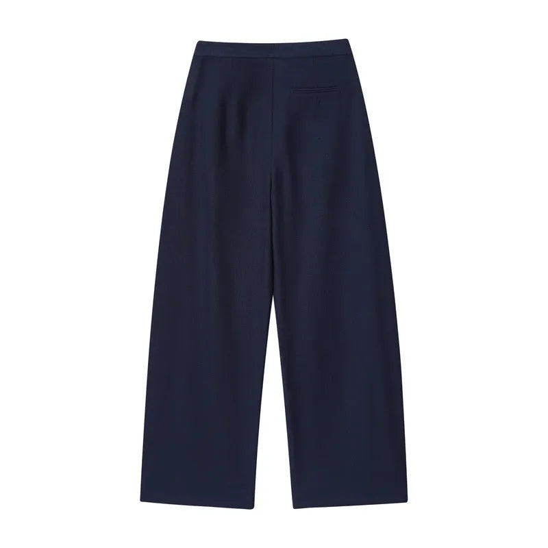 Women's linen blend two-piece set showing off-neck blouse with flounced sleeves and wide leg trousers