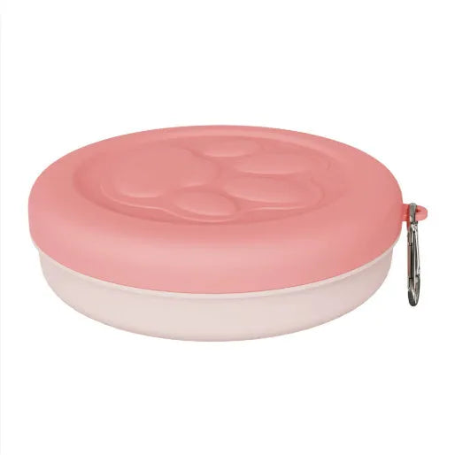 Portable dog feeding bowl with snack compartment lid in light green colour