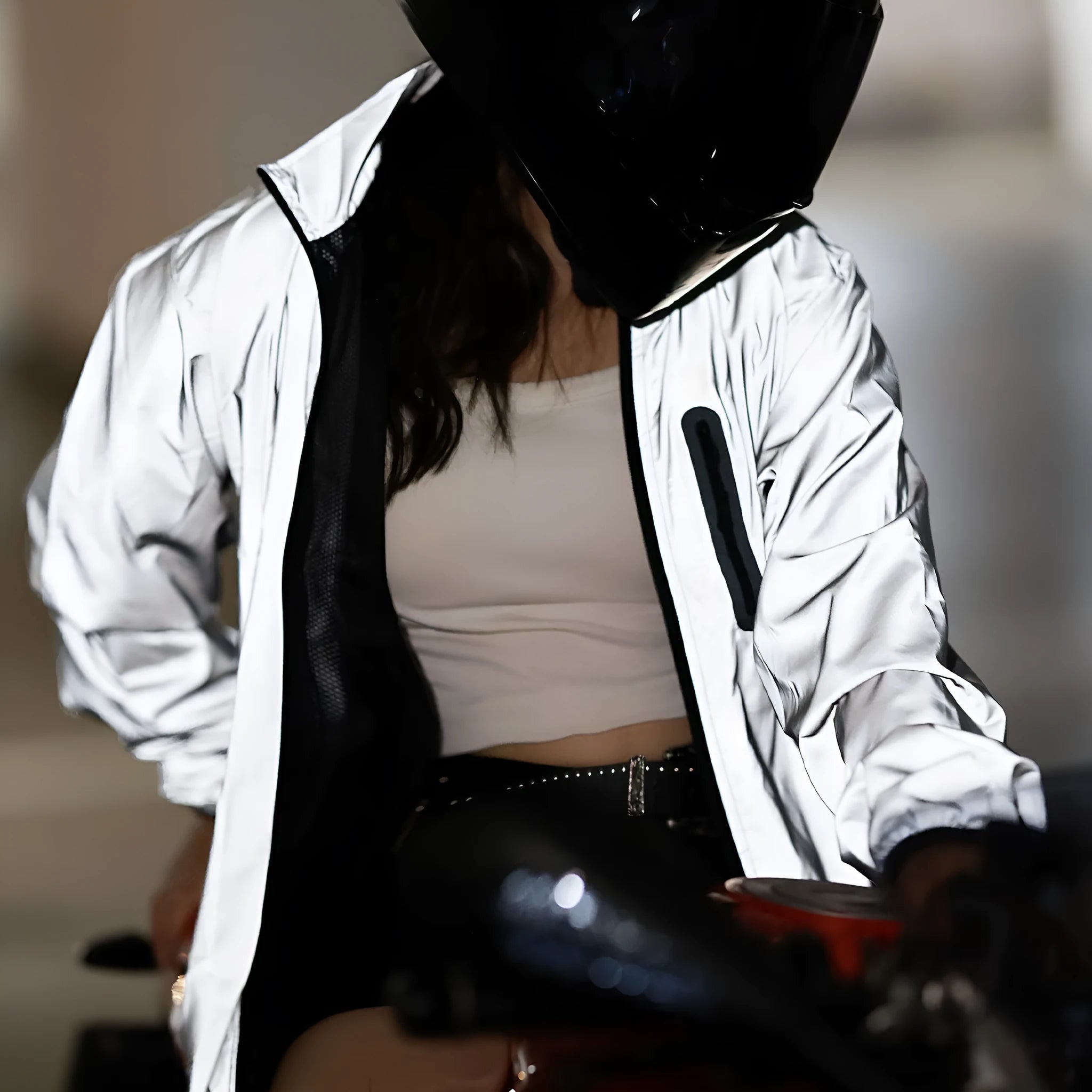 Silver waterproof polyester long sleeved jacket with windproof function, shown on hanger