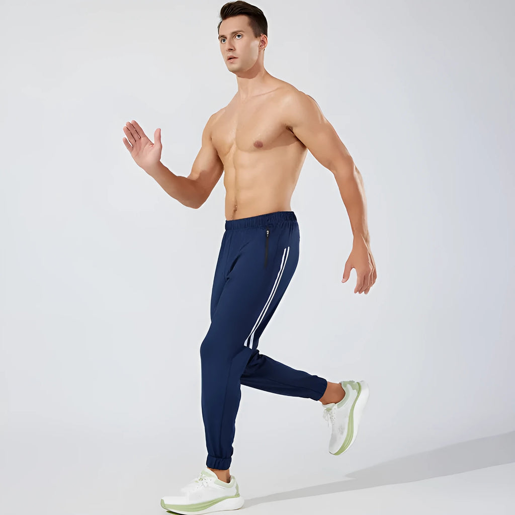 Men's black polyester running pants with mid waist design for exercise and sports