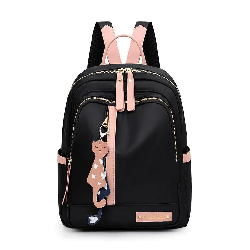 Women's black waterproof casual backpack with double shoulder straps and internal organisation compartments