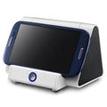 Black and white mini wireless Bluetooth speaker for mobile phones and computers.