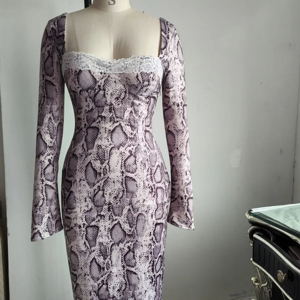 Grey slim-fit A-line dress with digital 3D print pattern and lace detailing, long sleeves.