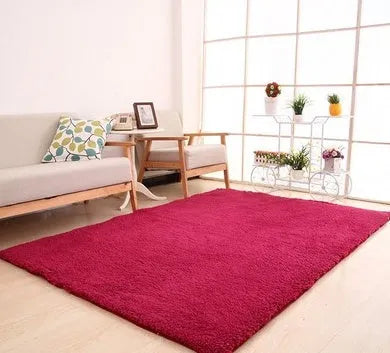 White plush rectangular area rug with a dotted non-slip bottom, shown at 40cm x 40cm size.