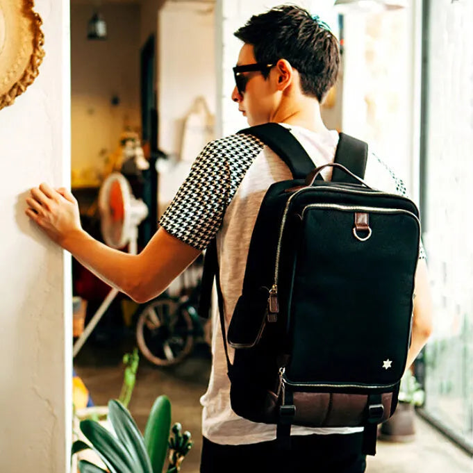 Modern large capacity Oxford cloth backpack in seven colour options showing 30cm width