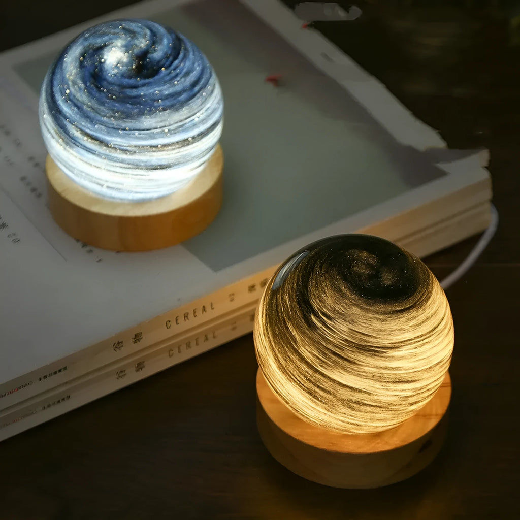 Planet-themed night light with USB cable and base, showing 80mm diameter globe