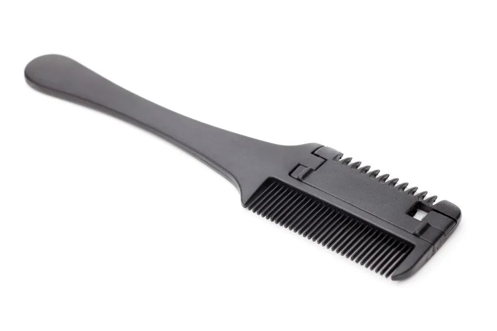 Pet razor comb for dogs and cats with replacement blades on a white background