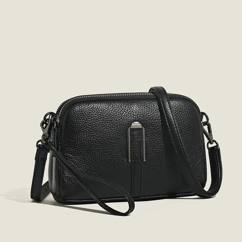 Women's genuine leather shoulder bag in square design with dimensions 19cm by 13cm by 6cm