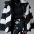 Women's faux fur coat with contrast lapel and fur collar in mid-length design