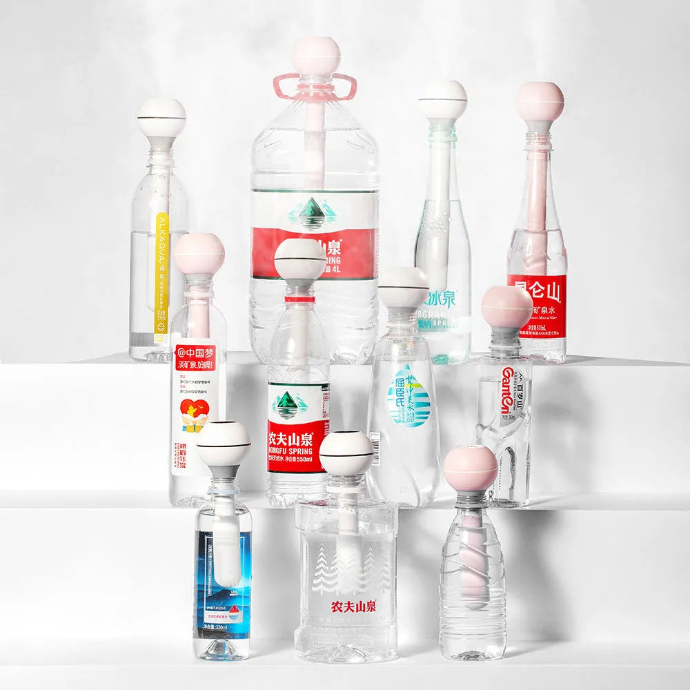 Columnar magic wand humidifier in pink or white with 1 litre tank and USB cable