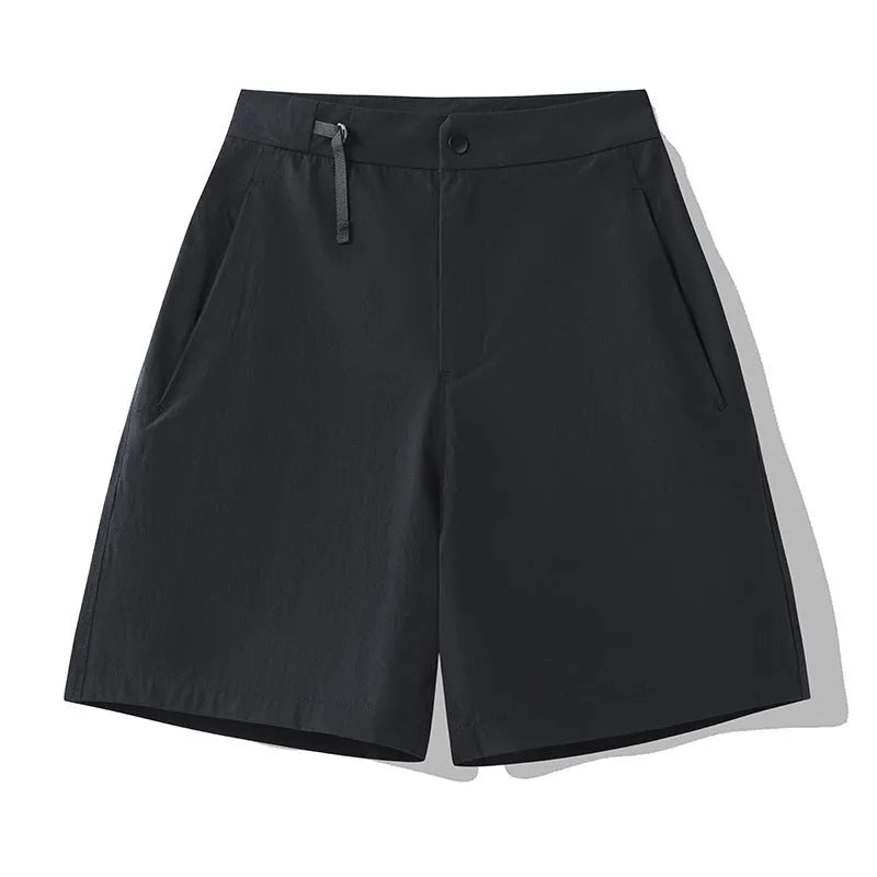 Men's solid colour quick-dry sports shorts with elastic construction for running and climbing.