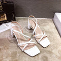 Women's thick heel Roman sandals in apricot colour showing one-strap design and substantial heel