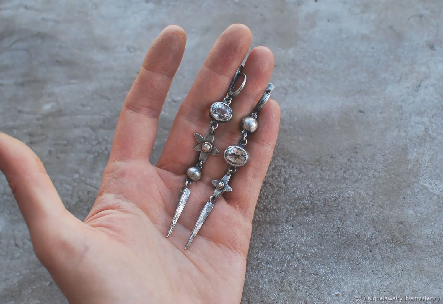 Pair of long geometric pendant earrings with rhinestones in antique silver colour