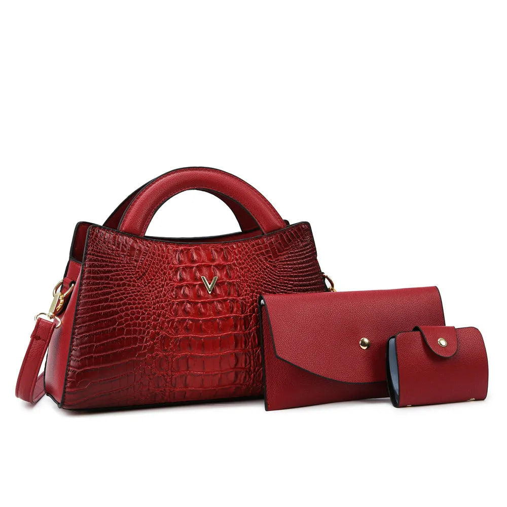 Women's black crocodile pattern PU leather crossbody handbag showing square shape and single shoulder strap.