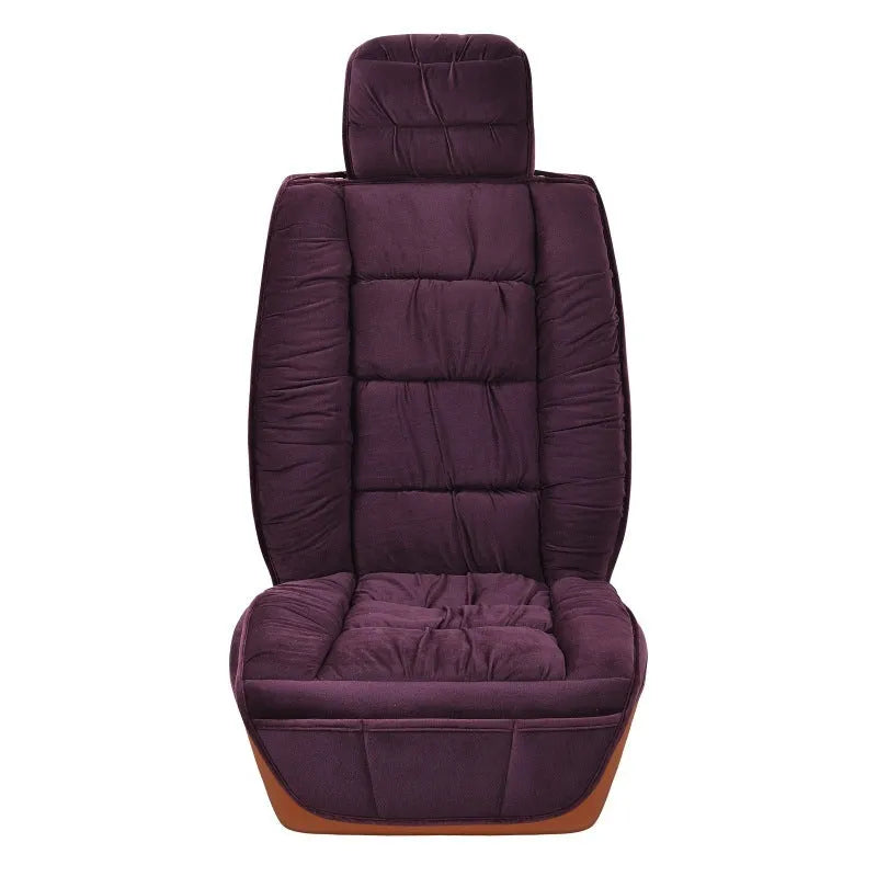 Short plush car seat cushion in charcoal grey on vehicle seat