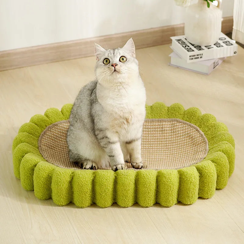 Green oval cat scratcher bowl bed with sisal scratching surface measuring 65cm