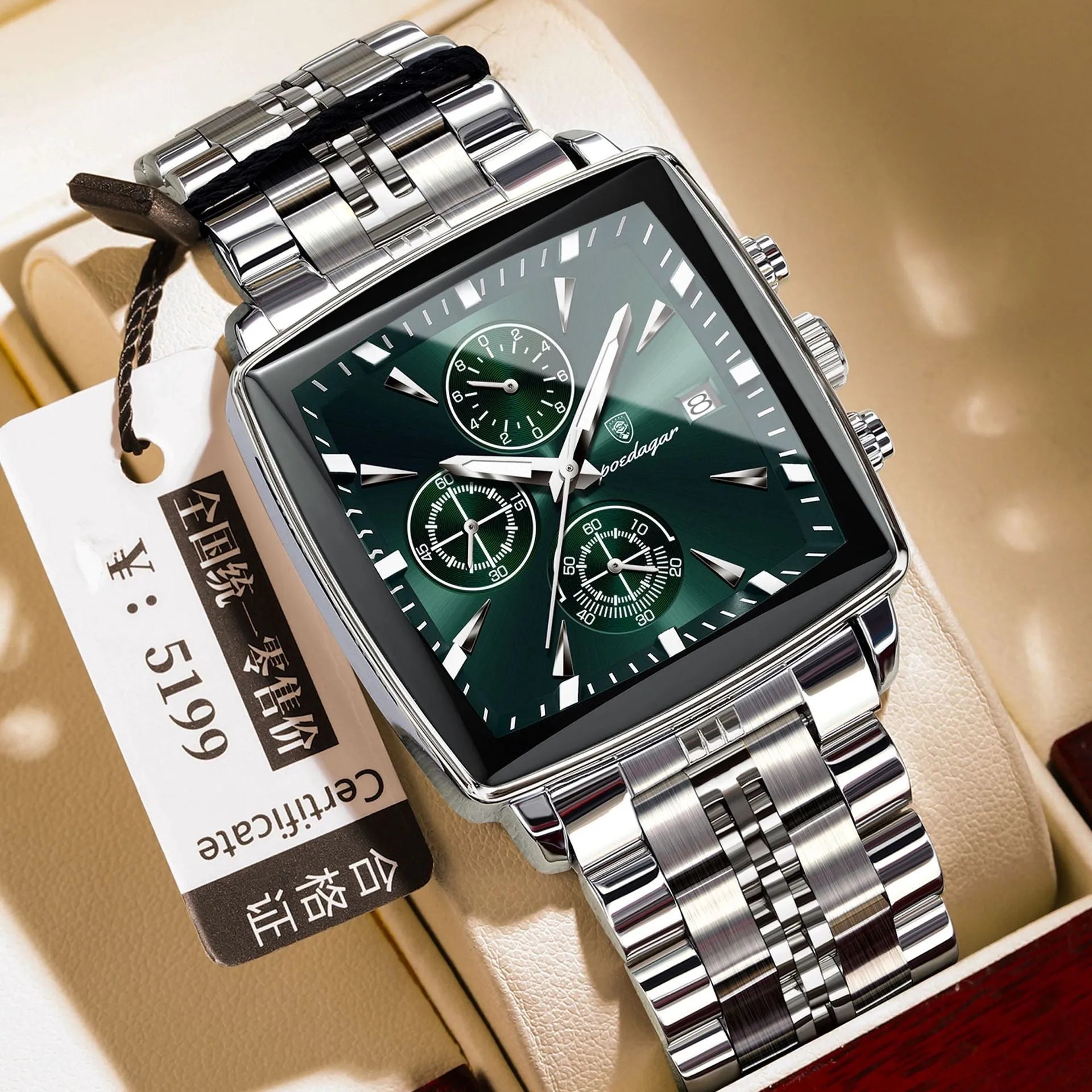 Square men's business watch with alloy case and stainless steel bracelet on wrist.